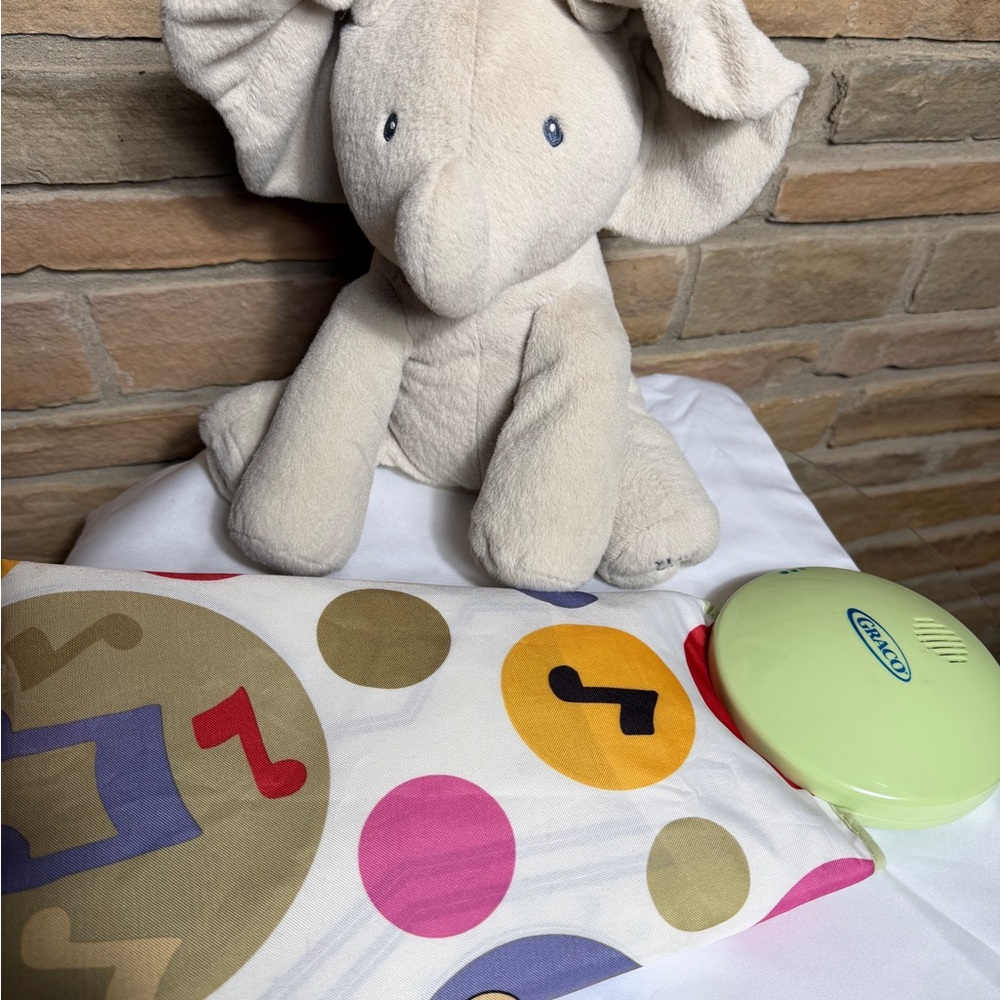 2 Infant toys-Gund Peek a Boo talking/ singing Elephant. Graco activity mat.